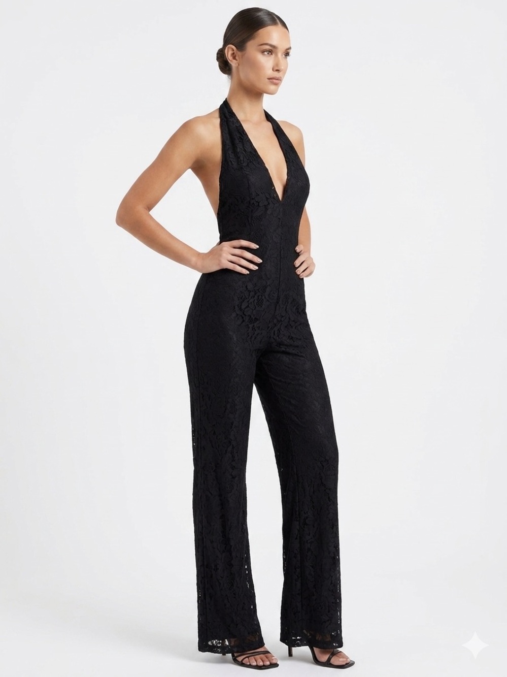 PrettyLittleThing Black textured Floral plunge
Halter neck  Jumpsuit